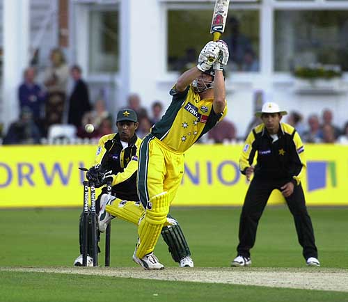 Gilchrist is bowled by Saqlain for 70